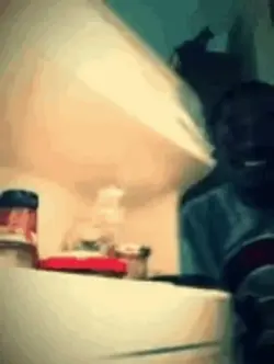 Guy opening fridge
