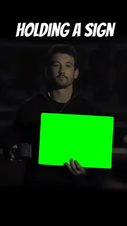 Holding a sign 