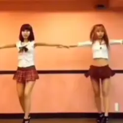 two girls dancing