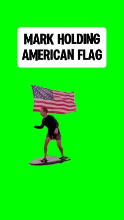 MARK HOLDING FLAG