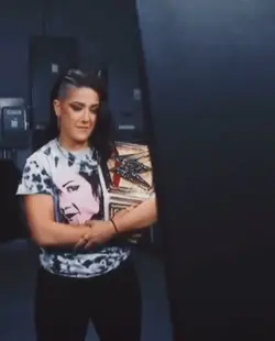 Bayley watches on