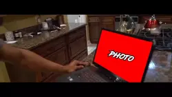 Man punching laptop
