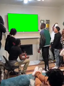 Man smashing TV