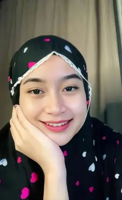 senyum manis