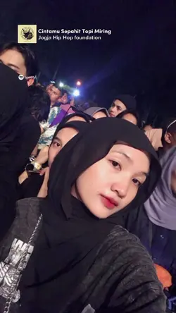 topi miring