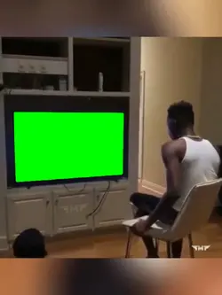 Man smashing TV