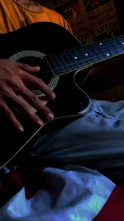 Playing guitar w/