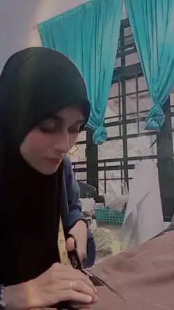 gunting kain