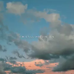 i'm still holdin' on