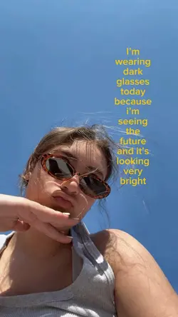 Wearing dark glasses
