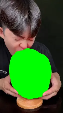 MAN EATING GREEN