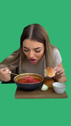 girl eating soup