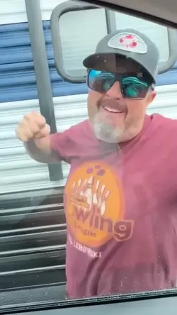 man punch window