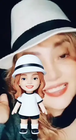Mini boneca