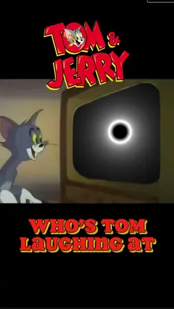 TOM LAUGHING