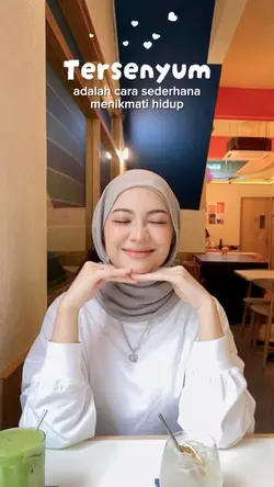 Tersenyum