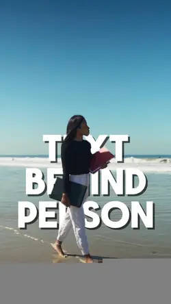Text behind person