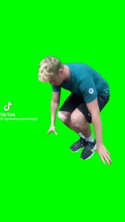 穴に隠れる男