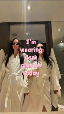 Wearing dark glasses