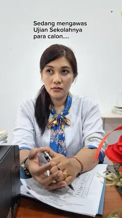 mengawas ujian