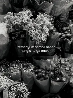 tersenyum sambil
