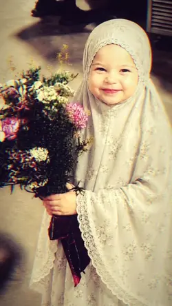 versi mukena