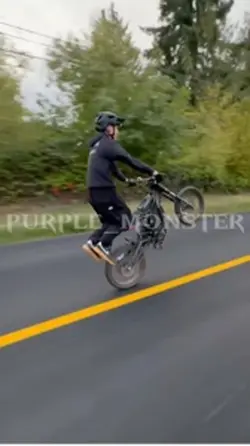 Surron wheelies
