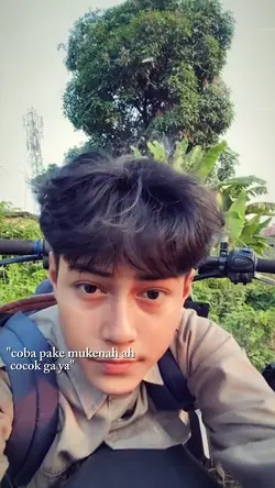 coba pake mukenah ah
