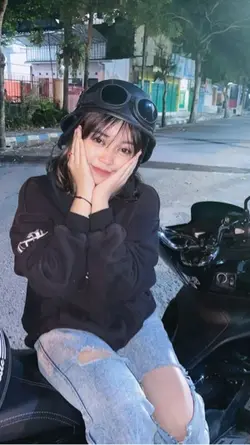Nona Ambon pica pica