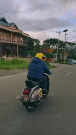 Naik vespa