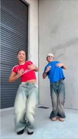 Two people dance