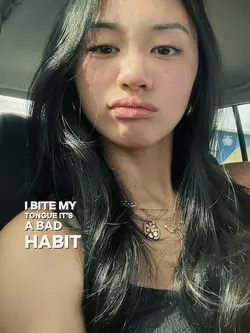 I bite my tongue