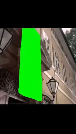 man tearing flag
