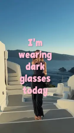 Wearing dark glasses
