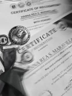 With honor/medals